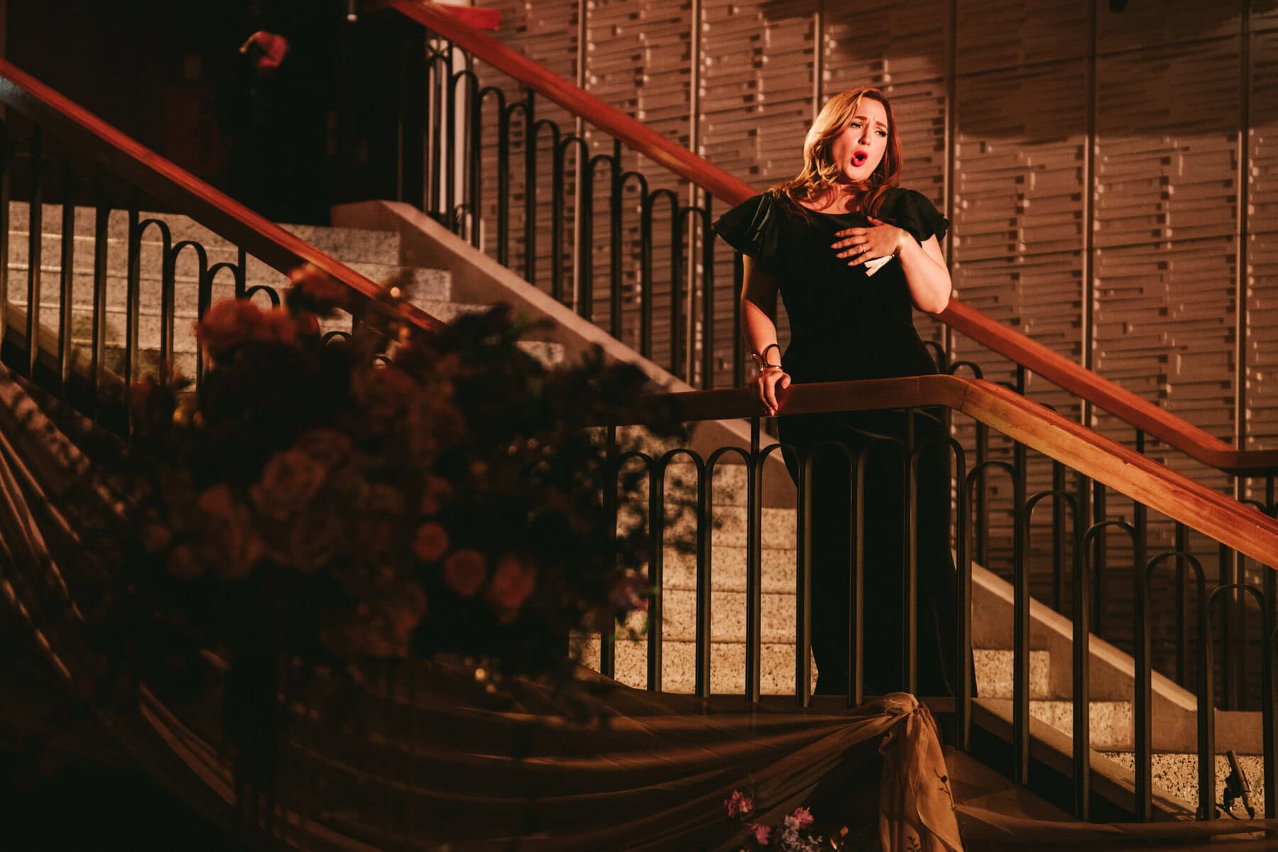 photo of justine ledoux a singing teacher with EXPRESS performing